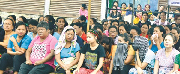 People mourn the eight people killed during mass protest at CCpur