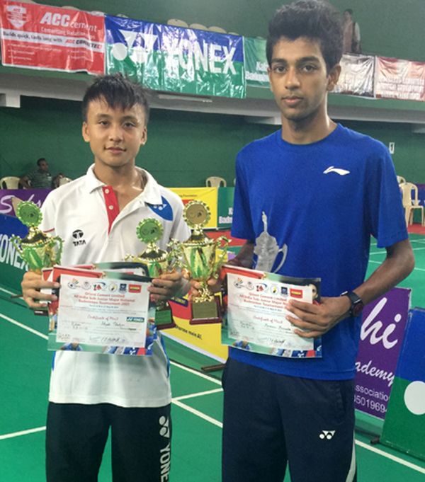 Maisnam Meiraba Luwang and his doubles partner Akash Thakur of Bihar pose with their trophies
