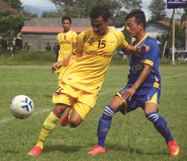 SSU (yellow) and NISA (blue) players battling for the ball