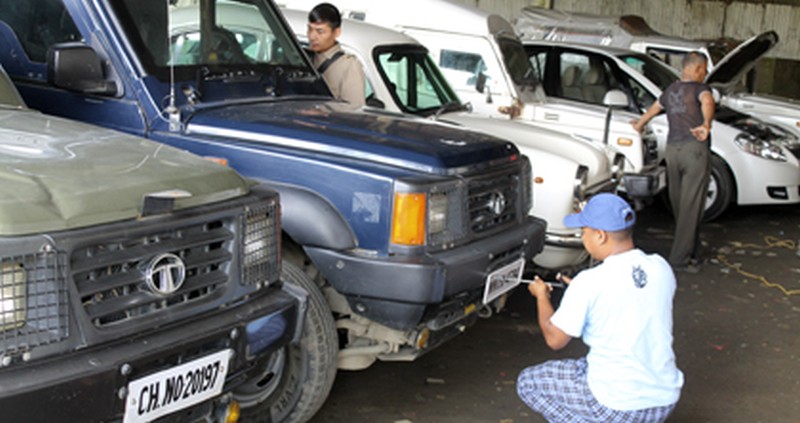 Vehicles belonging to the State's Home Department being fitted with High Security Registration Plate today at MSRTC complex located at Moirangkhom