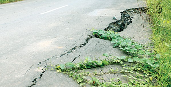 A badly damaged section of Imphal-Moreh highway