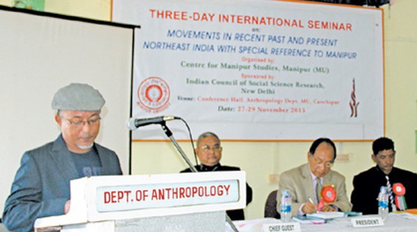 A speaker delivering a speech at the seminar