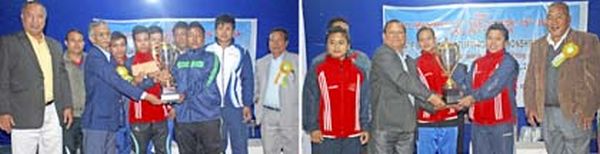 Men's overall team champion KPC, Hiyangthang (left) and women's overall team champion SAI-SAG, Imphal receiving champion trophies