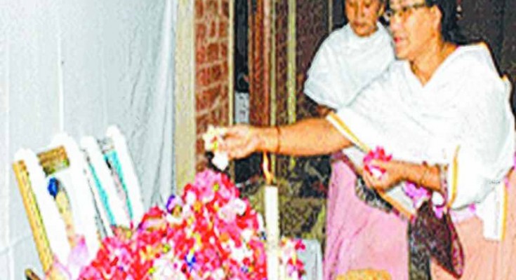 File photo of tributes being paid to Rabina and Sanjit on their death anniversary