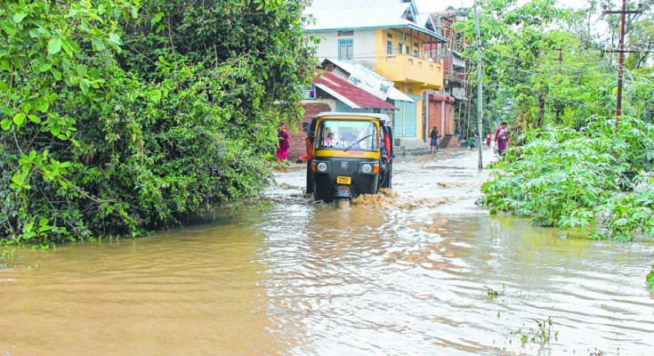 Flash flood inundates houses, dam collapses