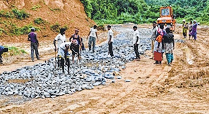 Labourers working on the Imphal-Jiribam highway-File photo