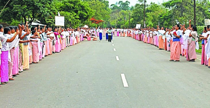 Womenfolk line up during the bandh on the Chingmeirong-Sekmai stretch of the highway