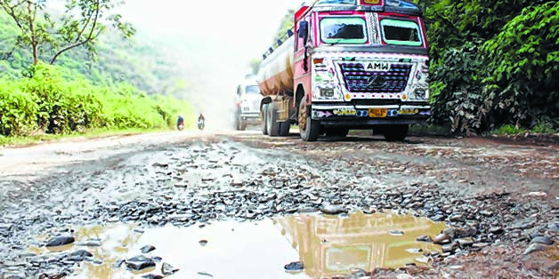  Deplorable condition of National Highway 2 near Sapormeina
