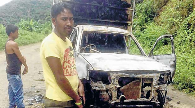 A goods carrier burnt during the blockade-File photo