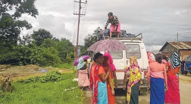 Womenfolk checking a vehicle while enforcing counter economic blockade
