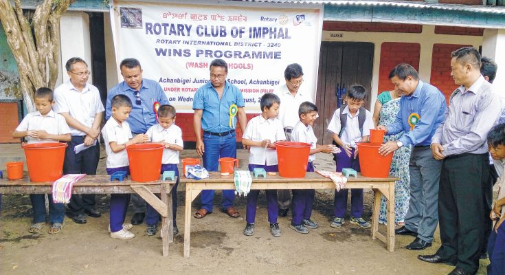 Rotary Club of Imphal at Achanbigei Govt Junior High School inaugurating e-learnign centre and teaching hand washing techniques