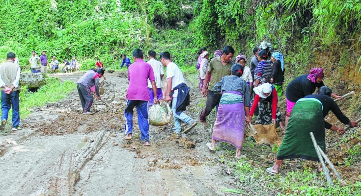 Citizens repair Maram-Purul road