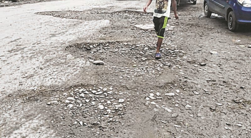 Major roads in Imphal dotted with potholes