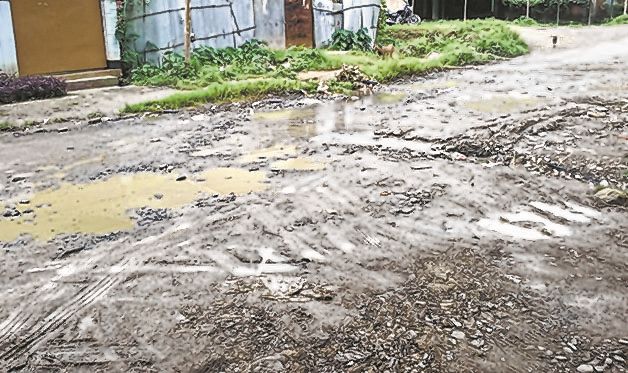 Apathy, neglect written all over Langol Housing Complex road