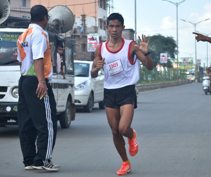 Thousands runs the UPF Mega Marathon Laithangbam Ranjan Singh and Nongthombam Chaoba Devi clinch men's and women's title