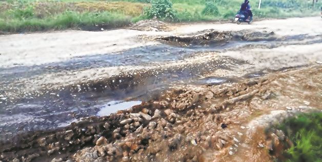 Potholes adorn Imphal-Andro road