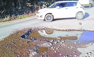 Potholes dot Imp-Kpi road stretch