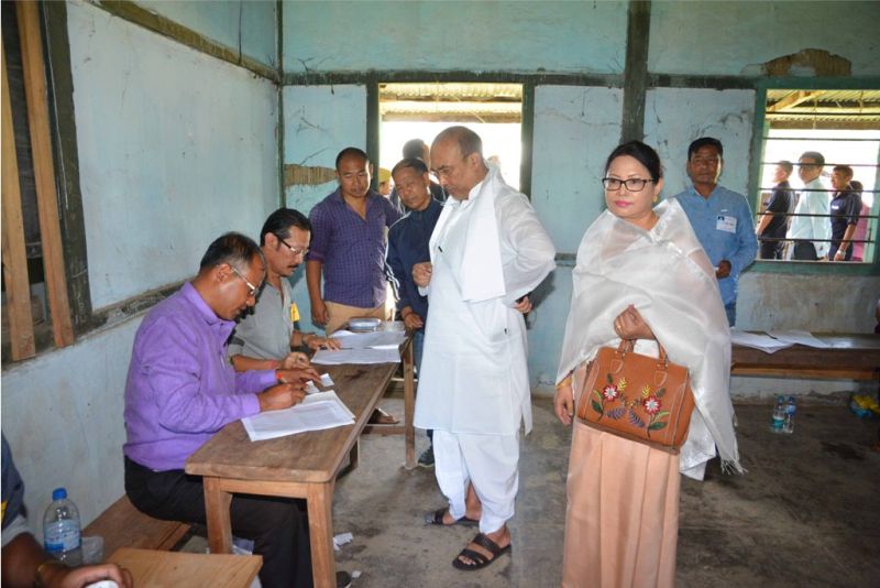 CM Biren with wife at a polling station