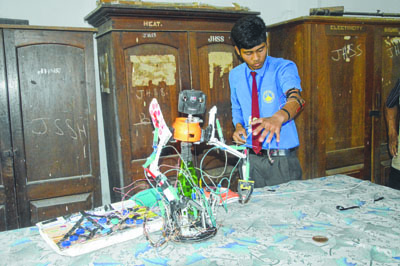 School student makes 'robot' with discarded household items