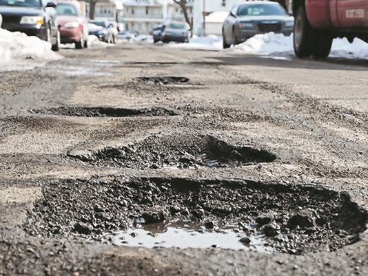 Road full of potholes, people pin hope on CM for remedial works