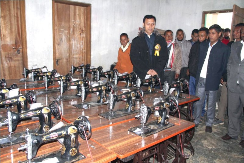 Radheshyam distributed labour cards and opened tailoring and cutting training centre at Heirok