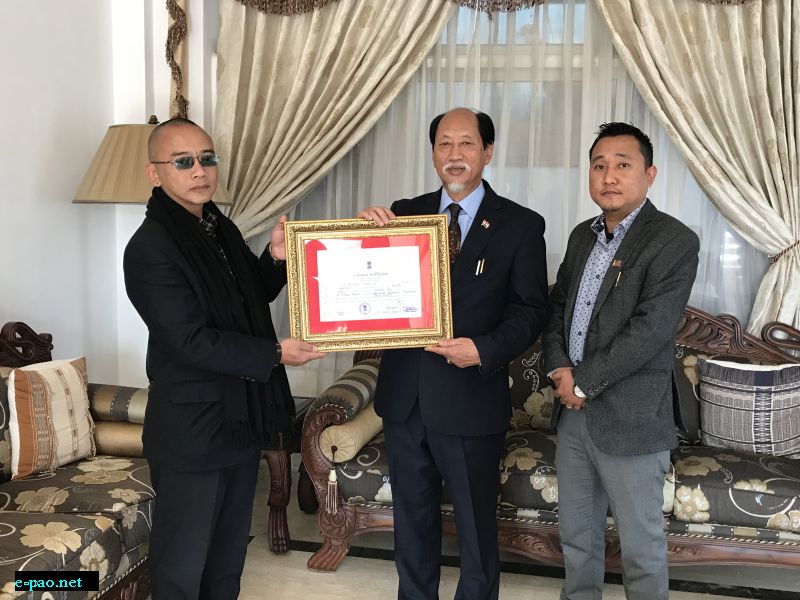 ADC Chiephobozou, Sangmai C.Imlong (L) and EAC Botsa, Bendang (R) handing over the Certificate of Election to Neiphiu Rio, newly elected Member to the 13th Nagaland Legislative Assembly from 11  Northern Angami II A/C on  17th February 2018 at Kohima