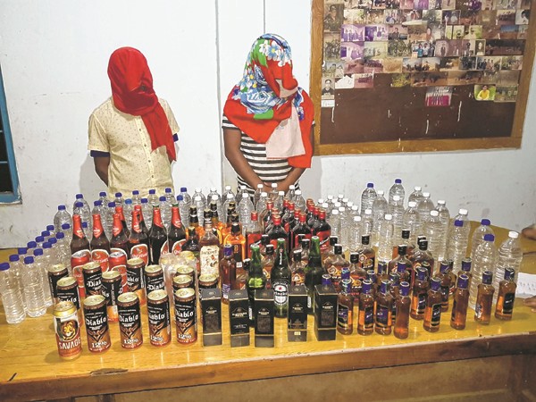 Two held with liquor