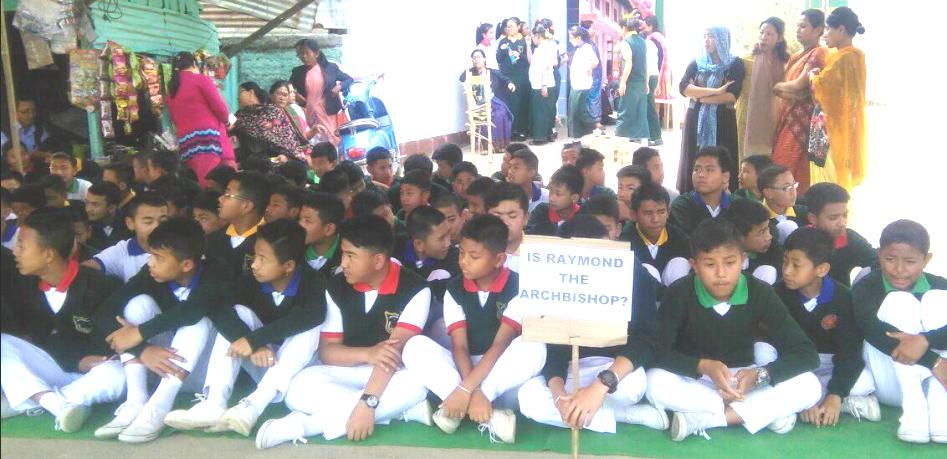 Parents, teachers and students of Catholic School Canchipur stage protest against the transfer of the school Principal