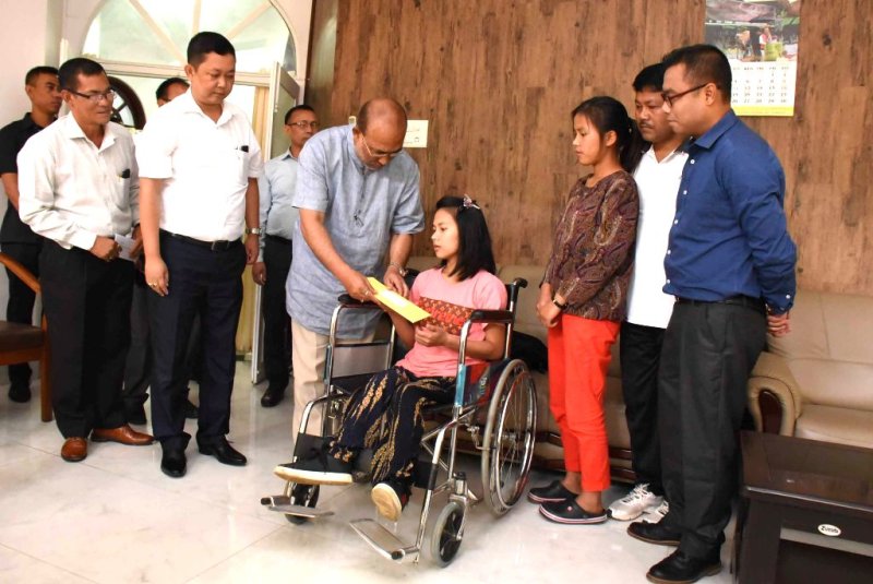 CM hands over loan amount differently-abled girl