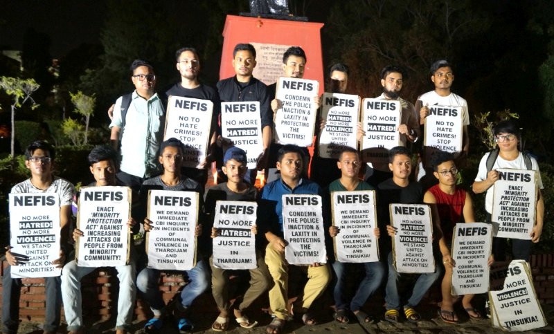 NEFIS organizes candle light vigil at DU