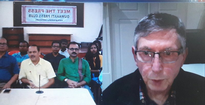 Alan Gray nteracting with scribes at Guwahati Press Club through video conferencing from Australia