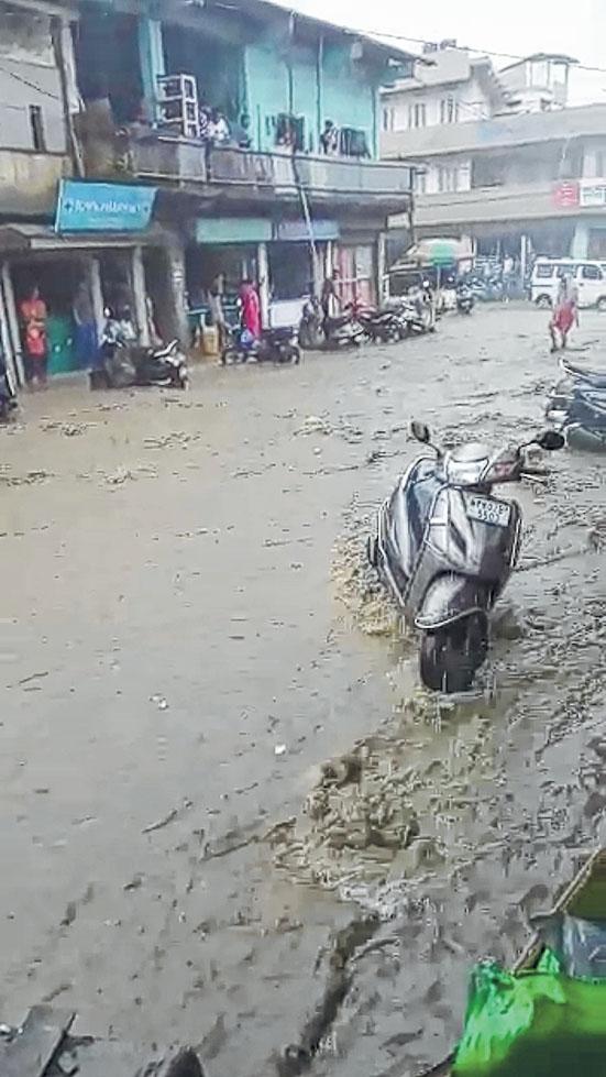 Heavy downpour turns road into watercourse