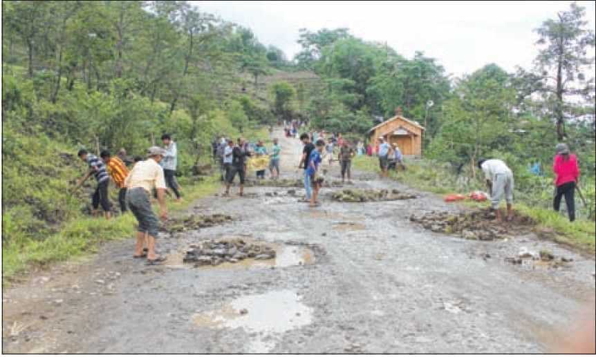 Villagers take onus of repairing highway
