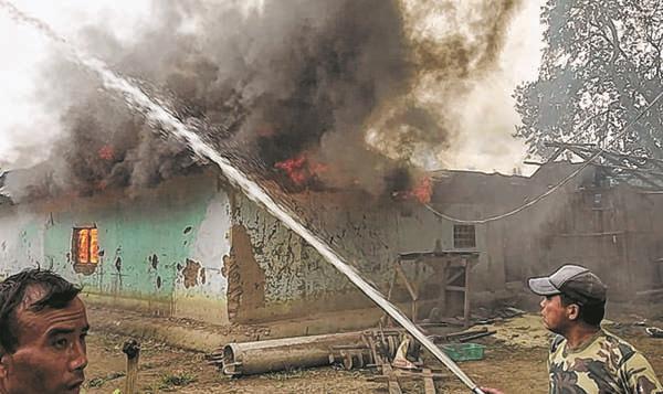 One killed in land row, locals burn down houses