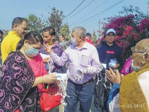 Kakching MLA distributes face masks