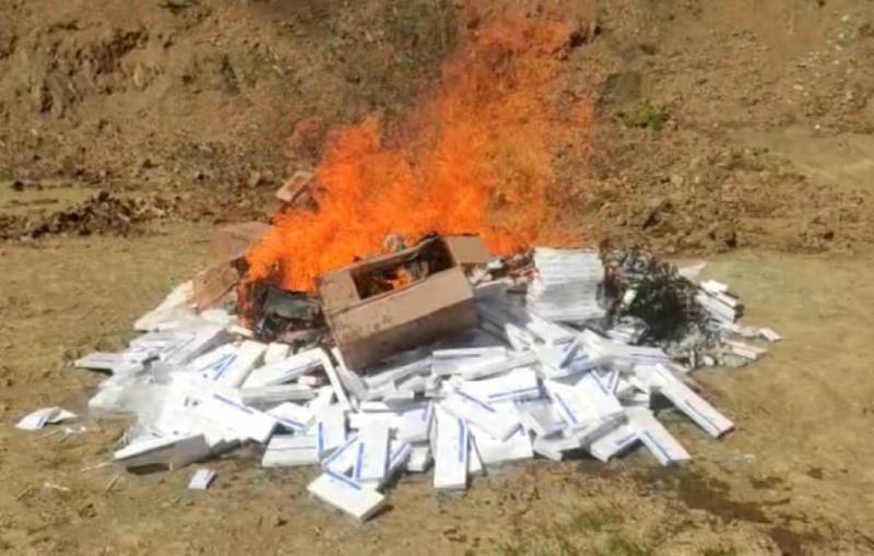 Local Meira Paibi seized and set ablaze foreign made cigarette