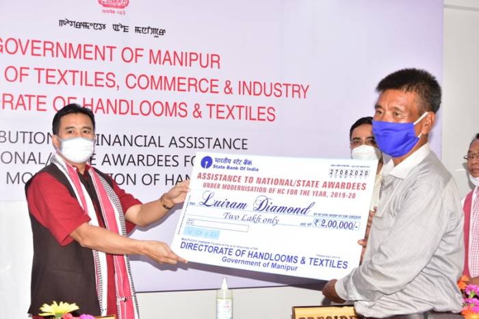 Minister Biswajit hands over handicrafts scheme assistance to artisans
