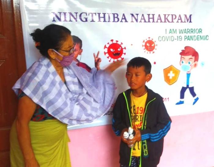 9 years old kid celebrates birthday by distributing face masks