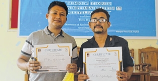 Two TSE staffs bag best reporting prize on wetlands