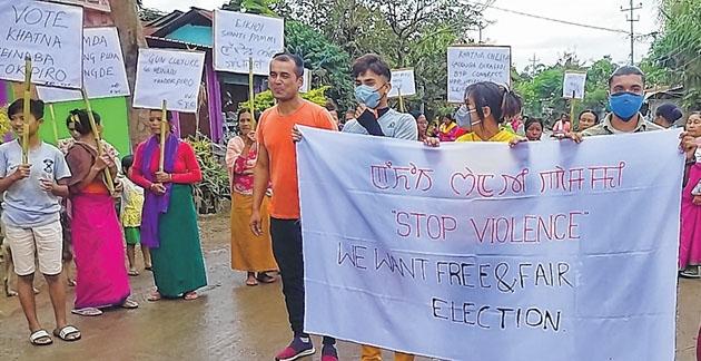 Locals form human chain denouncing pre-poll violence