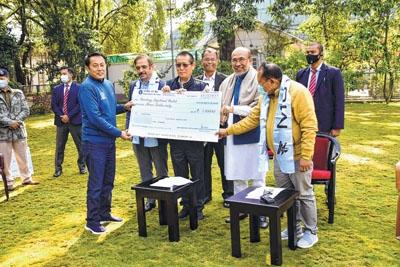 CM hands over financial assistance to football clubs