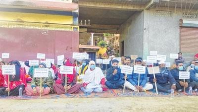 Sit-in staged against firing incident