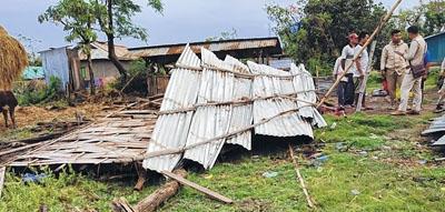 Storm blows away houses, inflicts heavy losses