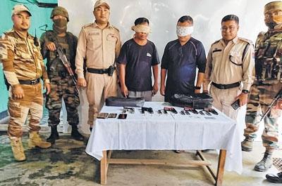 Two including Myanmarese held with arms