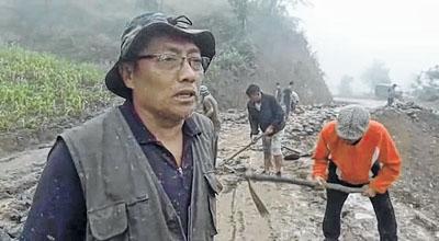 Villagers take onus of repairing road