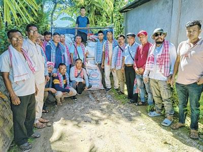 UPF team hands over relief materials for Cachar flood victims