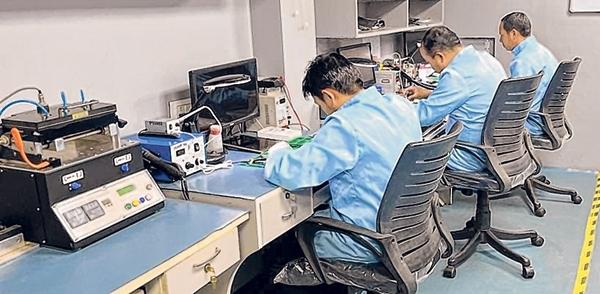Many find reliable source of income in phone servicing