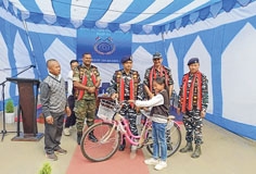 109 Bn CRPF distributes bicycles to girl students at Mao Gate