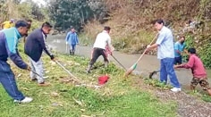 Cleanliness drive conducted along Wangjing river