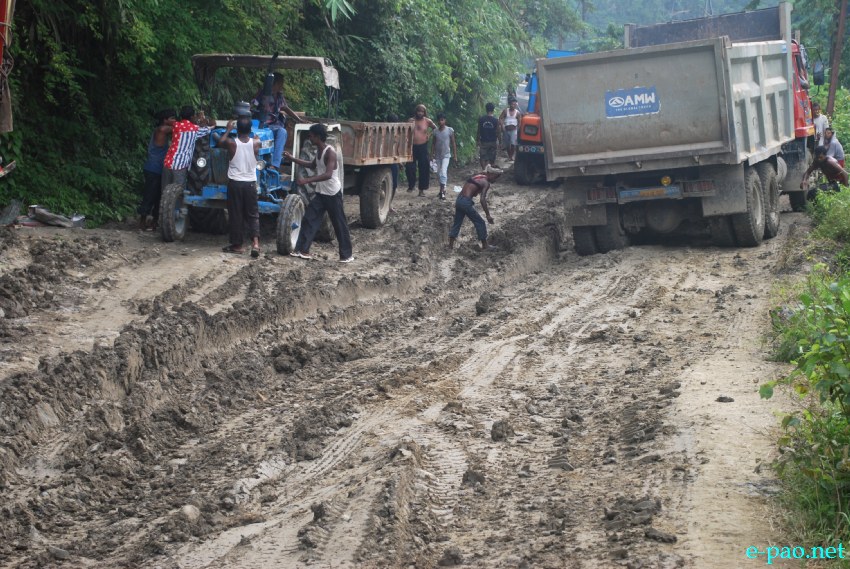 The pathetic/deplorable section of NH-37 connecting Imphal and Jiribam sub-division bordering Assam as on July 21 2013 .